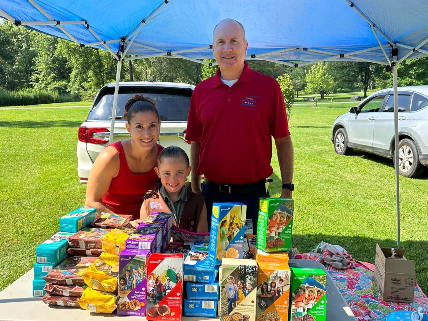 Paul Rickard visiting a Girl Scout cookie table at a Mount Hope community event